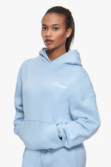WOMEN CONTRAST EMBO HOODIE BABY BLUE