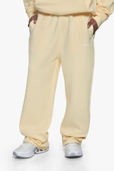 SLEEK LOGO OPEN LEG JOGGER BUTTER YELLOW