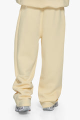 SLEEK LOGO OPEN LEG JOGGER BUTTER YELLOW