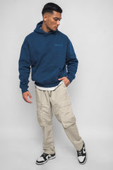 HEAVY OVERSIZE EMBO HOODIE WASHED INDIGO