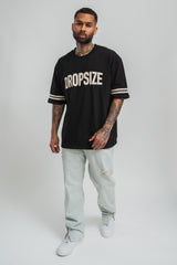 RIPPED LOOSE FIT ZIP JEANS