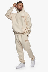 HEAVY  MIRRORED LOGO JOGGER COCONUT MILK