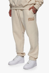 HEAVY  MIRRORED LOGO JOGGER COCONUT MILK