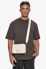 ESSENTIALS SHOULDER BAG CREAM